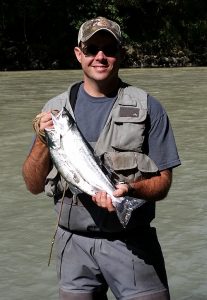 Veteran Jimmy Benedict Holding Fish